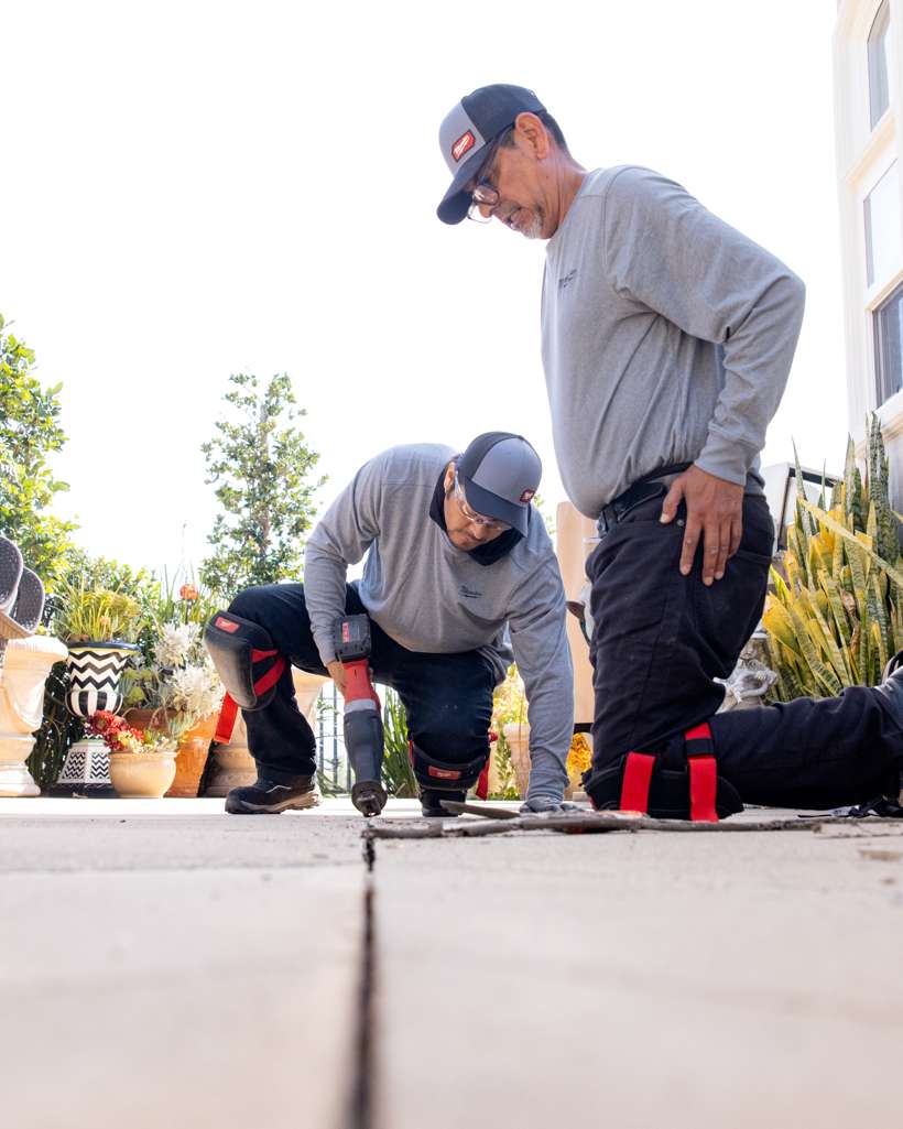 Milwaukee grinder cleaning the expansion joint