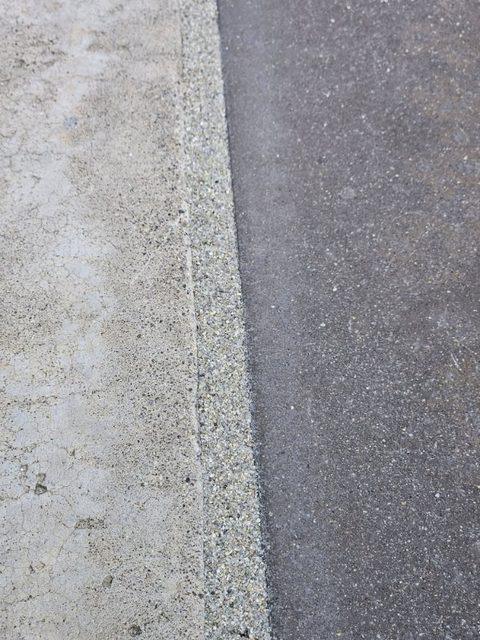 Finished edge where decking meets the drive