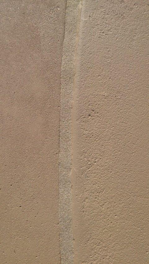 Tan sand finish bead between two deck slabs