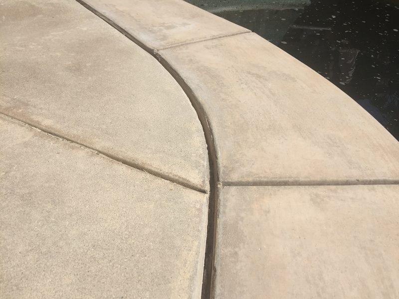 Joint cut open and cleaned back to sound concrete