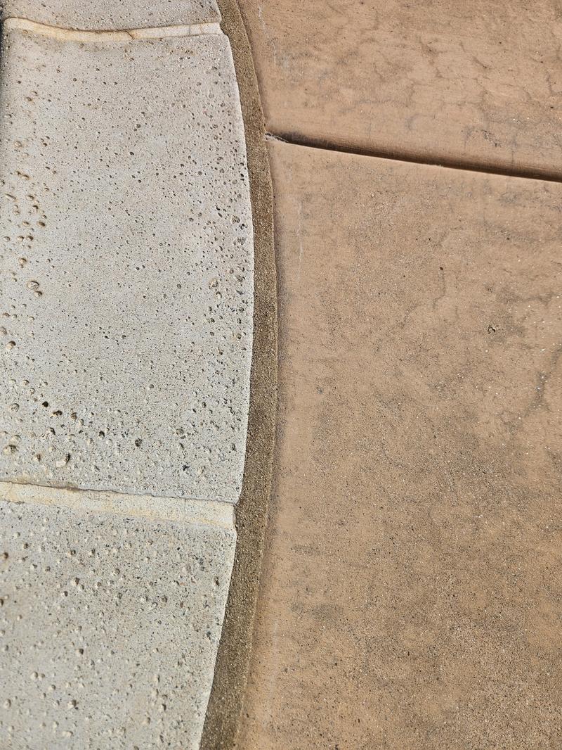 Tan bead carried around the coping radius, finished flush