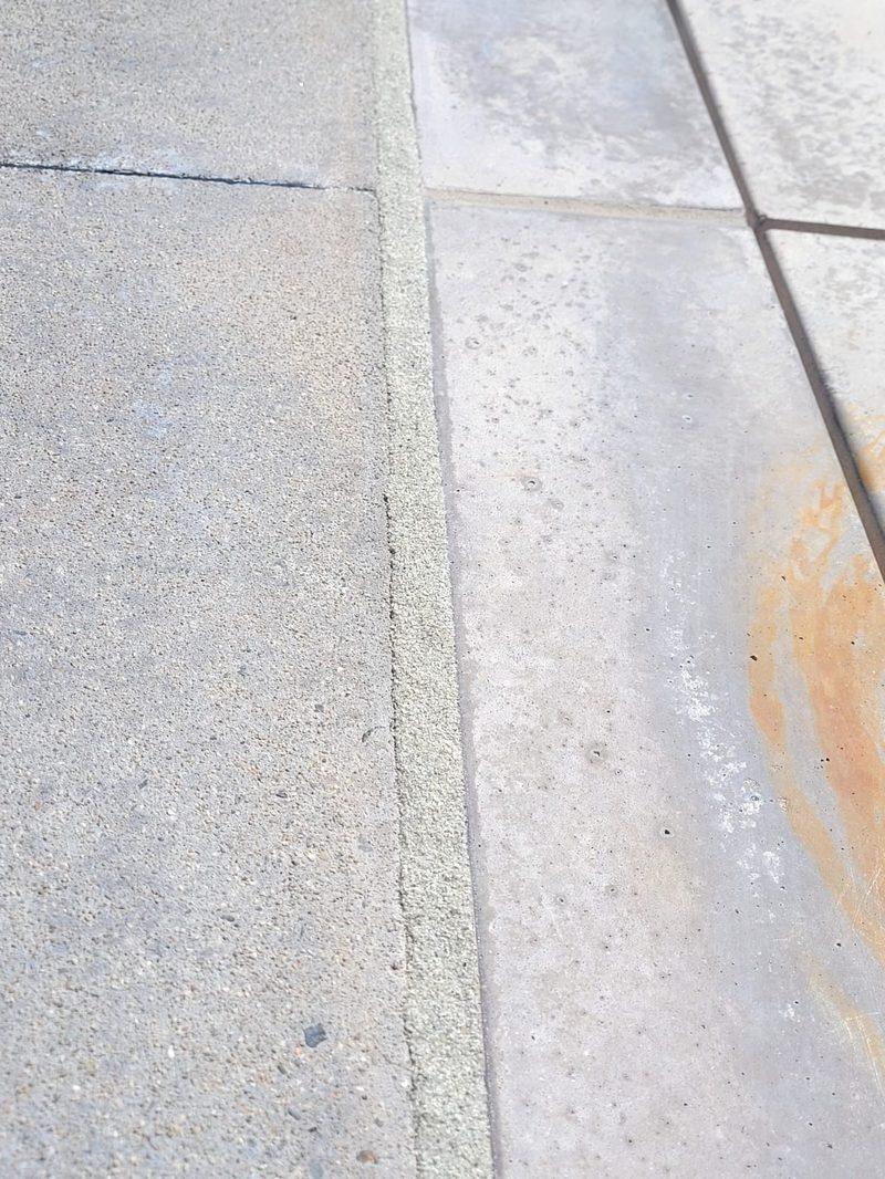 Clean line between aggregate decking and tile